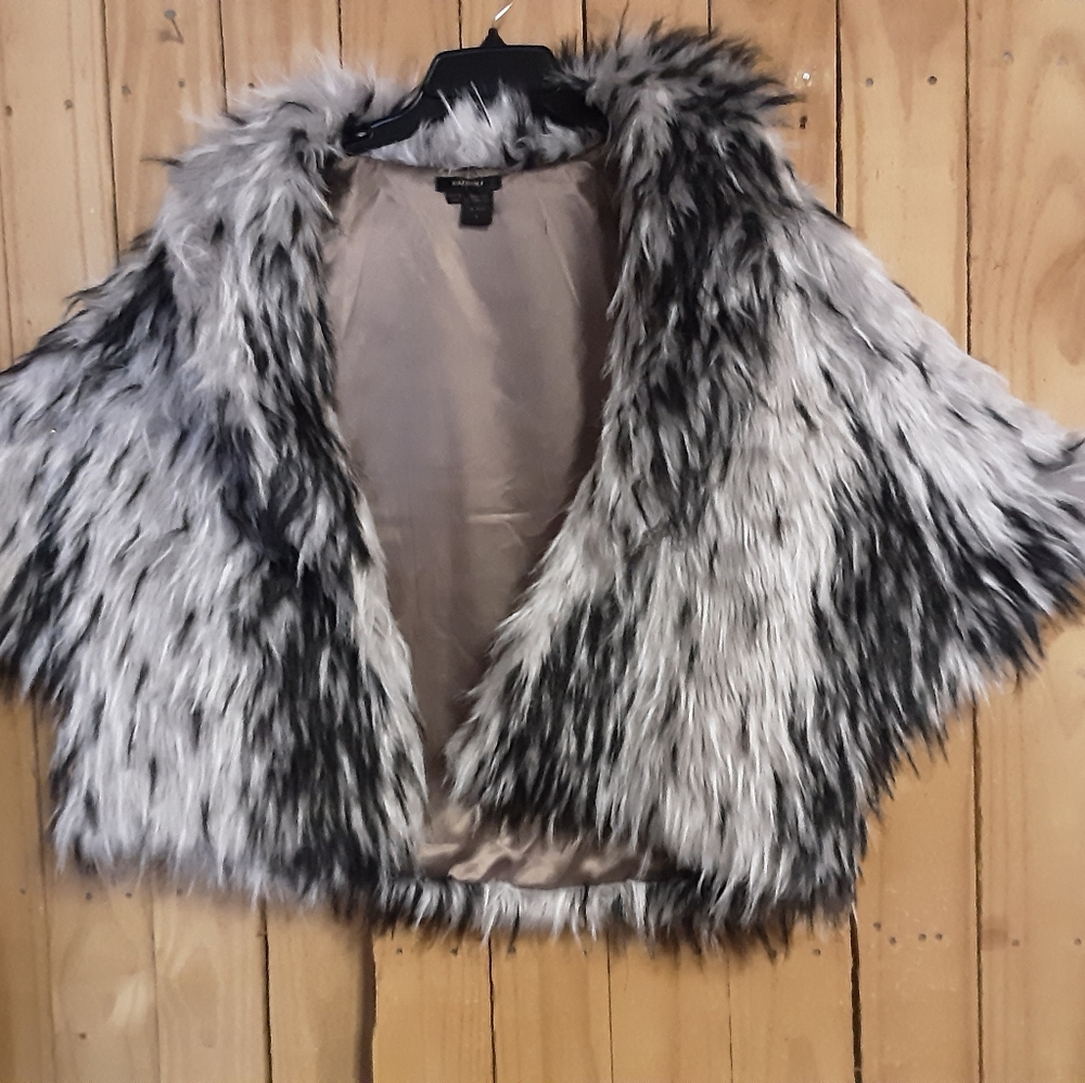 Poncho with insert sleeve